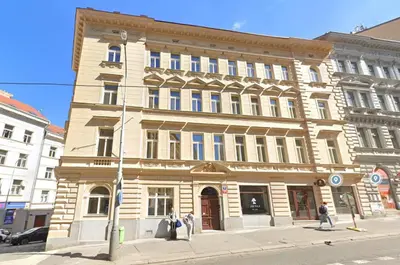 a large building on the corner of a street at 3BDR Elegance Deco Downtown Flat in Prague