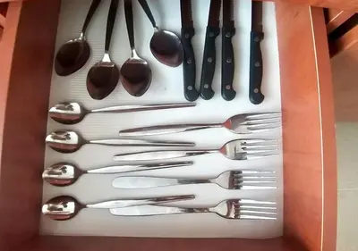 a drawer full of utensils in a wooden box at Green Studio Praha 2 l Ground floor Free PARKING in Prague