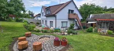 a house with a garden in the yard at Votice Luční in Wotitz