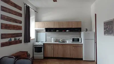 a kitchen with a white refrigerator and a microwave at Ubytování Ždírec - Apartmán 2 in Ždírec