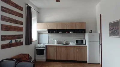 a kitchen with a white refrigerator and a microwave at Ubytování Ždírec - Apartmán 1 in Ždírec