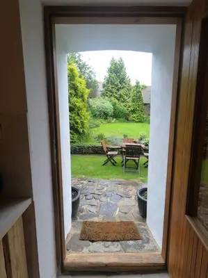 a view of a patio through a door at Lavender Apartment - perfect for families! in Stranný