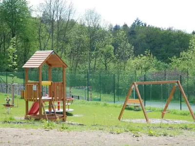 a group of people walking on a mountain at Lavender Apartment - perfect for families! in Stranný
