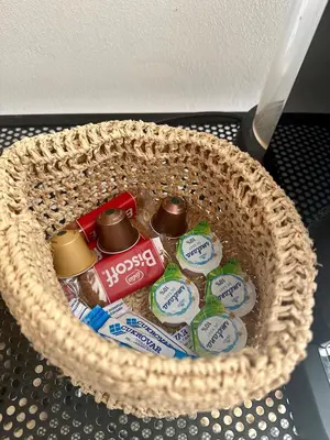 a basket filled with toothbrushes and toothpaste at Nature Nest in Prague