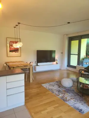 a living room with a large flat screen tv at Apartmán v Praze 6, Sedlec in Prague