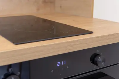 a stove top oven sitting on top of a counter at Studio Mozart, Free Onsite Parking, Air Conditioning, 1Gbs WiFi in Prague