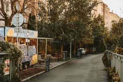 a street with a food stand on the side of a road at Elegant Apartments close to Center & Bike Path in Prague