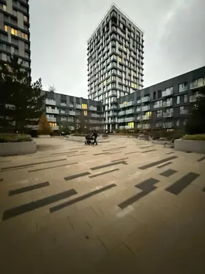 a large parking lot with tall buildings in the background at Garden Towers Apartment in Prague Center in Prague