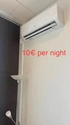 a white refrigerator with the words toe per night written on it at Apartment Českomoravská - O2 Arena Prague in Prague