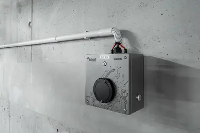 a tv with a cord attached to a wall at Manažerské bydlení - ROHAN CITY in Prague