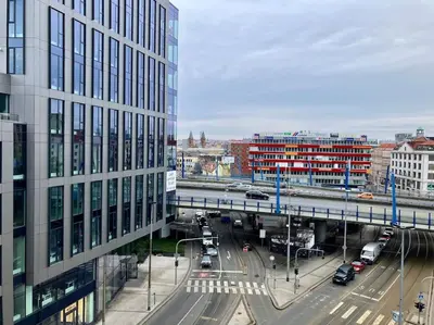 a view of a city with a bridge and traffic at Central Tiny Flat, 1GB WiFi, SMART TV, Air Condition in Prague
