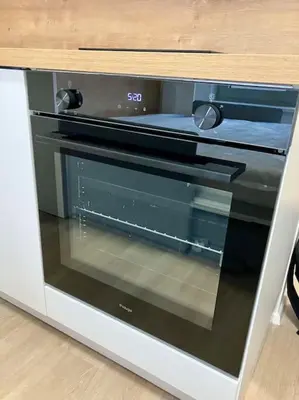 a microwave oven sitting on top of a counter at Central Tiny Flat, 1GB WiFi, SMART TV, Air Condition in Prague