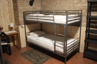 a couple of bunk beds in a room at Alba Hostel in Prague