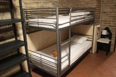 a couple of bunk beds in a room at Alba Hostel in Prague