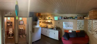 a small kitchen with a sink and a room at Biotop Kotlyk in Netvořice