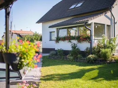a house with a swimming pool in front of a house at Holiday Home Starý Chodov by Interhome in Prague