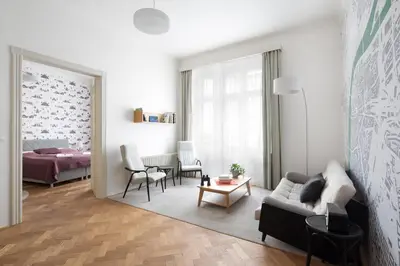 a living room with a couch and a table at Best Place in Prague in Prague