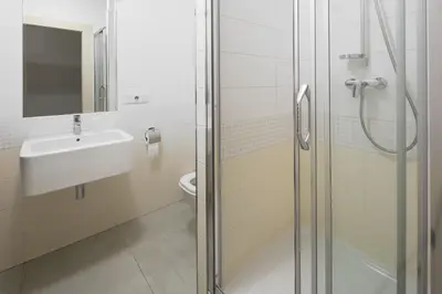a bathroom with a shower and a sink and a toilet at Best Place in Prague in Prague