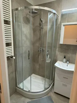 a bathroom with a shower and a sink at 1 Bed Flat - Sleeps 2 - Pets - Smoking on terrace in Prague
