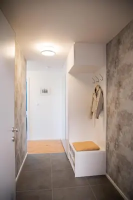 a bathroom with white walls and a walk in shower at Residence 60 free parking&wifi in Prague