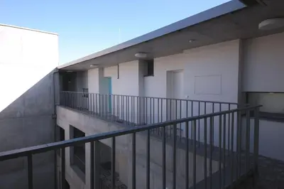 a view of a balcony of a building at Spacious Top Floor Flat, Air Conditioning, Free Parking, 200Mb WiFi in Prague