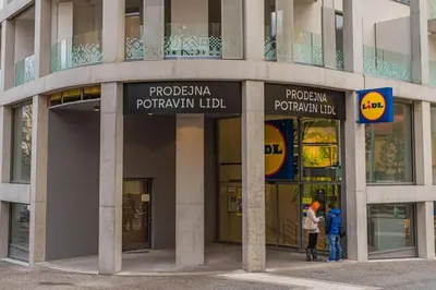 a building with people standing outside of it at On-site Free Parking, 12 to min Centre, Supermarket in Prague