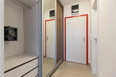 a dressing room with a mirror and a closet at Peace and Comfort Near Center with Balcony, 500MB WIFI in Prague