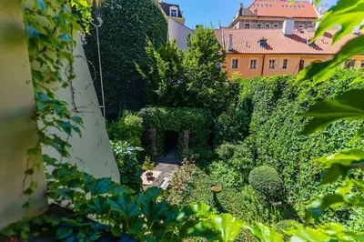 an overhead view of a garden in front of a building at Josef Manes birth house, All Sights Walkable, Old Town Square in Prague