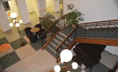 an overhead view of a staircase in a building at Masarykova Kolej in Prague