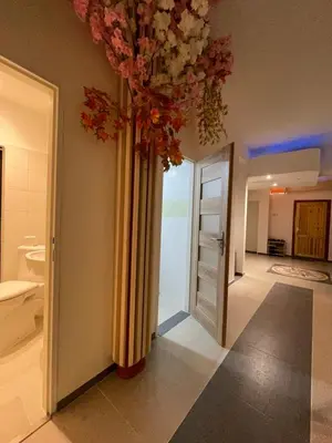 a bathroom with a vase of flowers on the ceiling at Trung Lo Cao in Prague
