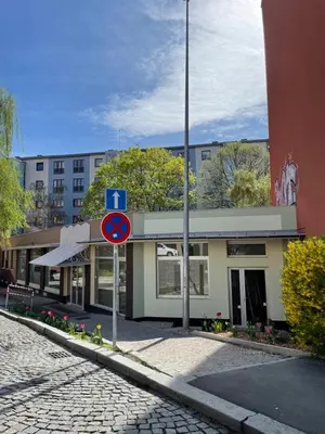 a building with a street sign in front of it at Trung Lo Cao in Prague