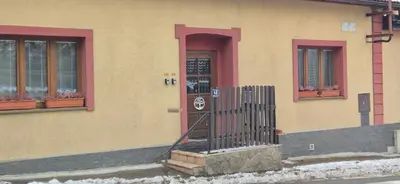 a living room with a couch and a window at U Čertovy brázdy in Sázava