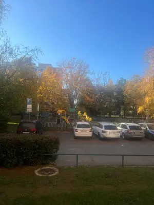 a group of cars parked in a parking lot at Útulný prostorný tichý byt v blízkosti centra in Prague
