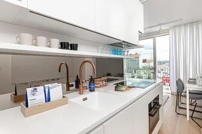 a kitchen with a sink and a counter top at Prague Days - Studio Apartment with Garage Parking and Balcony in Prague