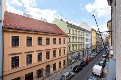 a view of a city street with buildings and cars at Unique Old Town 2BR Oasis with Sofa Bed in Prague