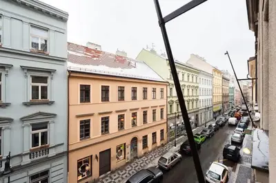 a view of a city street with buildings and cars at Tranquil Prague Studio Gem in Prague
