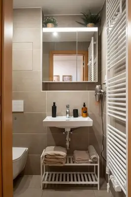 a bathroom with a sink and a toilet at New studio, King bed, Free parking, Terrace in Prague