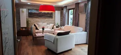 a living room with two chairs and a couch at Rodinný dům Praha 8, Kobylisy in Prague
