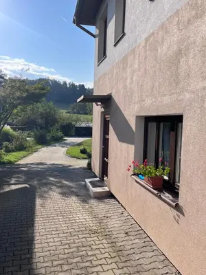 a bathroom with a washing machine and a toilet at Countryside nest in Babice