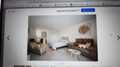 a living room with a couch and a table at Apartment near the beach,Marbella in Mladá Boleslav