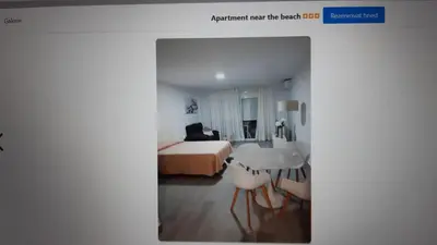 a hotel room with a bed and a table at Apartment near the beach,Marbella in Mladá Boleslav