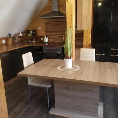 a small room with a crib and a window at Magical apartment Dobříš in Dobříš