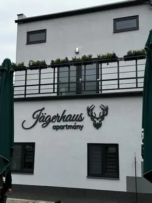 a sign on the side of a building at Apartmán 2 Jägerhaus in Libochovice