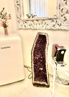 a cake sitting on a counter next to a toaster at Amethyst apartment in Prague