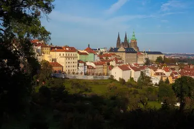 a view of a city with buildings on a hill at Apartment Dusni in Prague
