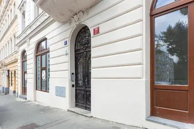 a door on the side of a building at Blueground Rostovska str renovated furnished PRG-19 in Prague