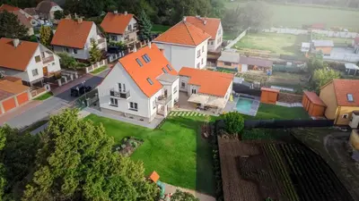 an aerial view of a house with orange roofs at Mezidomí in Budyně nad Ohří