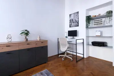 an office with a desk and a computer in a room at 3 Bedroom - Central Superior-Flat 115m2 in Prague