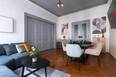 a living room with a couch and a table at 3 Bedroom - Central Superior-Flat 115m2 in Prague