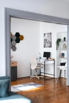 an office with a desk with a computer and a chair at 3 Bedroom - Central Superior-Flat 115m2 in Prague
